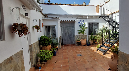 View of the large red tiled patio